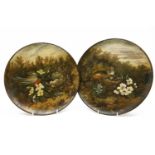 A pair of Watcombe, Torquay, pottery plaques, painted with bird's nests, impressed marks, 29cm