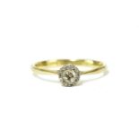 A gold single stone illusion set diamond ring,1.53g