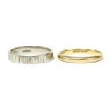 A 22ct gold wedding ring, and an 18ct white gold wedding ring, 3.17g