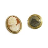 A gold picture locket brooch, with painted image of a dog and coin to reverse, 7.81g, and a 9ct gold