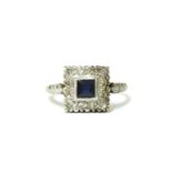 An 18ct gold square cut sapphire and diamond cluster ring,4.79g