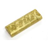 A gold plated Cartier cigarette lighter, of ovoid form, brushed textured exterior no. 36942,