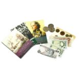 A collection of coins and bank notes, to include commemorative examples, sample collectors packs and
