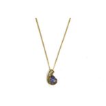 A 9ct gold pear shaped tanzanite and brilliant cut diamond pendant, on a gold trace chain, marked