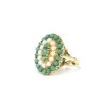 A 14ct gold stained howlite and cultured pearl cluster ring, finger size P½