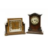An Art Deco mantle clock with pendulum and key, together with a Victorian walnut mantle clock