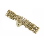 A 9ct gold five row gate link bracelet with padlock,11.31g