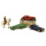 A Tri-ang 'Minic' cabriolet in box, together with an unboxed example, a Minic racing car and a