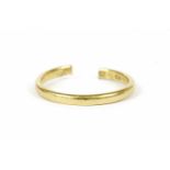 A 22ct gold wedding ring (cut open through shank)3.01g