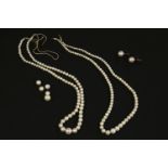 A collection of pearl items, to include two single row graduated cultured pearl necklaces, one