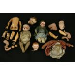 Two bisque head Armand Marseille dolls, numbered 351/3, and 390, and three further heads, limbs