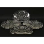 A set of six Lalique France 'hustle' salad plates of crescent form