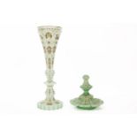 A Bohemian green glass vase, with gilt and enamel decoration, and an associated lid, vase 41cm,