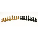 A Staunton chess set, in natural and black stained wood, the case with a Jaques & Son Ltd label,