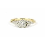 A gold single stone illusion set diamond ring, marked 18ct PLAT,2.10g