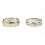 A 9ct white gold band ring, with engraved decoration, and another 9ct white gold band ring with