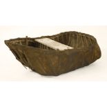 A traditional Welsh river coracle,having cane and split wood framework,120cm wide, 92cm deep, 61cm