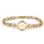 A ladies 9ct gold Rotary mechanical bracelet watch, silvered dial, Arabic and baton dial and
