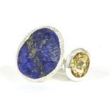 A silver un-cut free form lapis lazuli ring and oval cut citrine ring17.65g