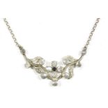 A silver necklace with sapphire and moonstone cabochon floral centrepiece, on belcher link chain