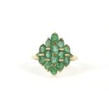 A 9ct gold emerald lozenge shaped cluster ring, size O3.08g