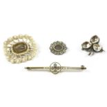 An Edwardian gold quatrefoil aquamarine and split pearl bar brooch, a Georgian silver shamrock