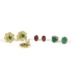 A pair of white gold single stone oval cut emerald stud earrings, butterflies deficient, a pair of