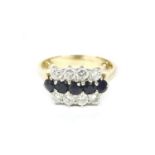 An 18ct gold three row sapphire and diamond ring, by Crop and Farr, five round cut sapphires between