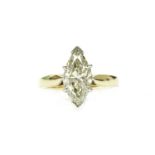 An 18ct gold single stone fancy, marquise cut diamond ring, a fancy light brownish yellow marquise