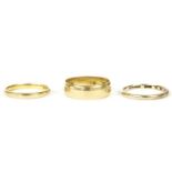Two 22ct gold wedding rings, and another 9ct gold wedding ring22ct - 6.16g - size N and L½9ct 1.