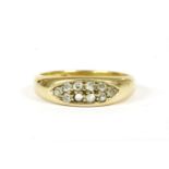 An 18ct gold two row diamond cluster boat shaped ring, (one stone deficient) Chester 18953.89g