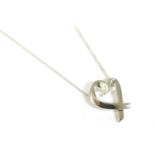 A sterling silver Tiffany Loving Heart necklace, designed by Paloma Picasso, with an open heart