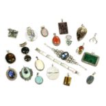 A collection of assorted silver and white metal gemstone pendants, to include a large silver