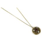 A Victorian gold garnet and cabochon locket, with plaited hair verso on chain6.64g