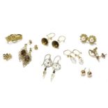 A collection of gold earrings, to include a pair of 9ct gold Maple leaf earrings, 0.85g, a pair of