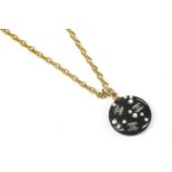 A Chanel navy round pendant necklace, with applied simulated pearl and double 'C' monogram, gold