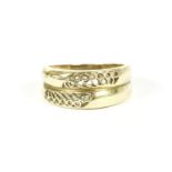 A two row openwork band ring, marked 'Mega 58', 3.99g