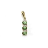 A 9ct gold tsavorite garnet and diamond bar pendant, garnet pendant 1.46g