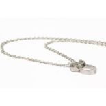 A 18ct white gold Cartier Love necklace, with interlocking Love ring pendants suspended on a white