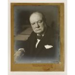 A signed photograph of Winston Churchill, signed in ink and dated 1942 on the mount,image 25 x