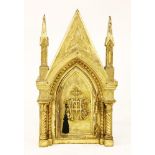 A church tabernacle,mid-late 19th century, modelled as a Gothic arched doorway, centred with '