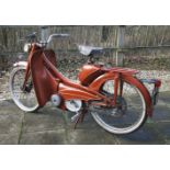 A 1964 Mobylette 50cc pedal moped,registration number ADX 35B, no papers, appears to be in good