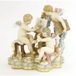 A Meissen group of three cherubs at an easel, c.1880-90, with underglaze blue crossed swords mark