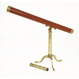 A Regency Dollond 'Two Feet and Half Achromatic' lacquered brass and wooden table telescope,in a
