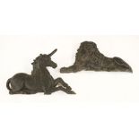 A pair of Victorian cast iron doorstops, one in the form of a lion, the other a unicorn, each