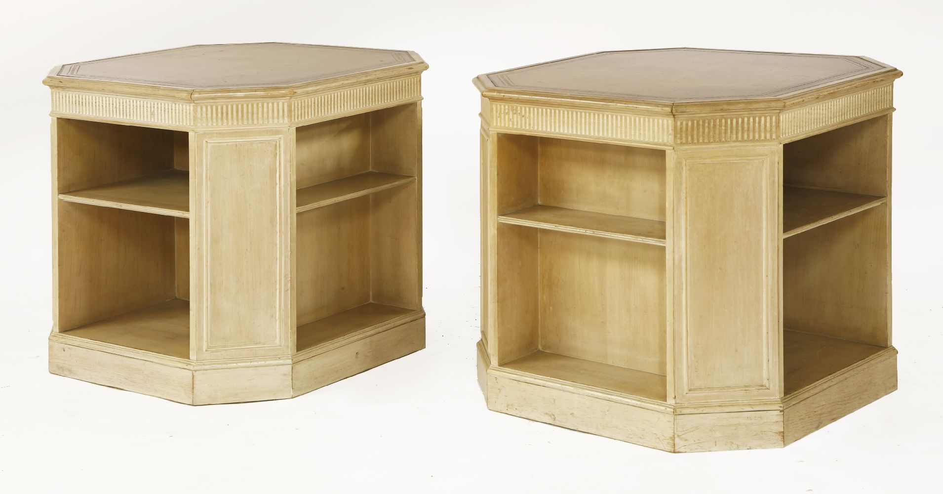 A pair of occasional tables, of square octagonal form, inset with leather tops and with