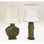 Two bronze lamps,20th century, modelled as Chinese archaic vases, mounted on mahogany stands, with