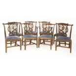 A set of eight Chippendale-style mahogany dining chairs, 20th century, each with pierced and