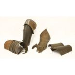 Four armour items,16th century, comprising: gauntlet, elbow piece, upper arm (articulated), lower