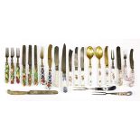 Twenty-three items of ceramic-handled cutlery,comprising: thirteen knives, eight forks and two